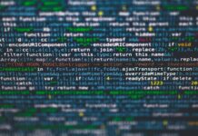 Programowanie funkcyjne bez strachu: wprowadzenie do Scali i Elixira krok po kroku Kolorowy kod programistyczny z bliska na ekranie monitora