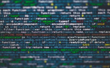 Programowanie funkcyjne bez strachu: wprowadzenie do Scali i Elixira krok po kroku Kolorowy kod programistyczny z bliska na ekranie monitora